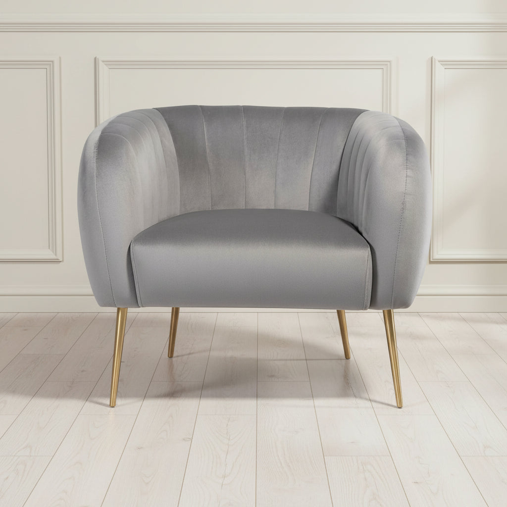 grey velvet armchair with gold legs